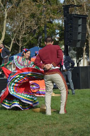 Los Lupenos repforms Mexican folk dancing during Dia de los Muertos celebration at St. James Park on Oct.22