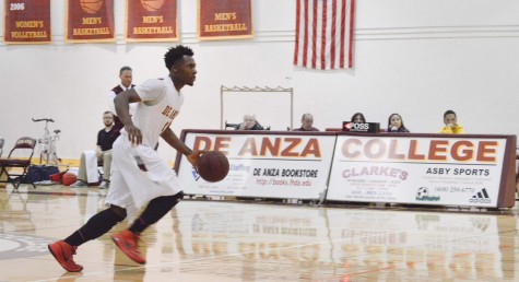 Forward Ifeanyi Ekechukwu (4) moves down court in the Dons game against Gavilian College on Friday, Jan. 15. 