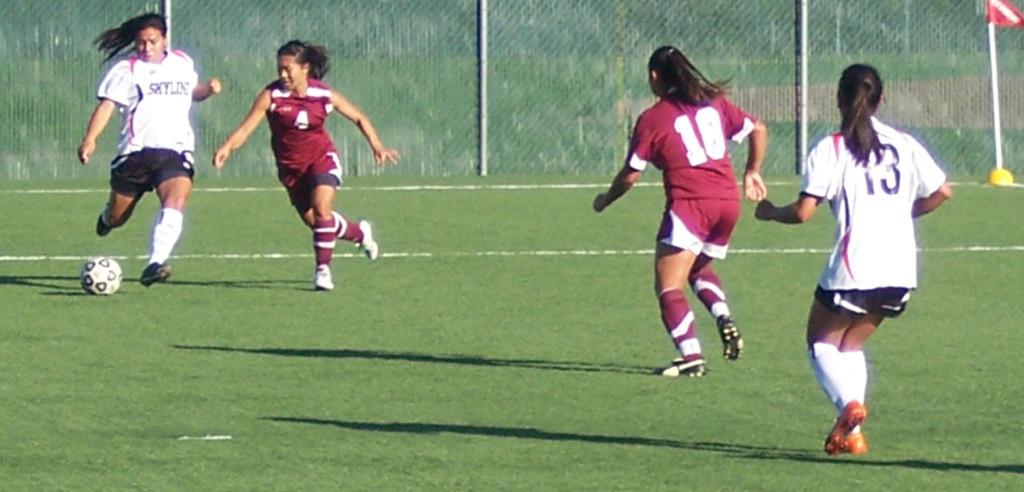 De Anza College defense tries to prevent Skyline College from scoring again in the first half of the home game on Oct. 15.