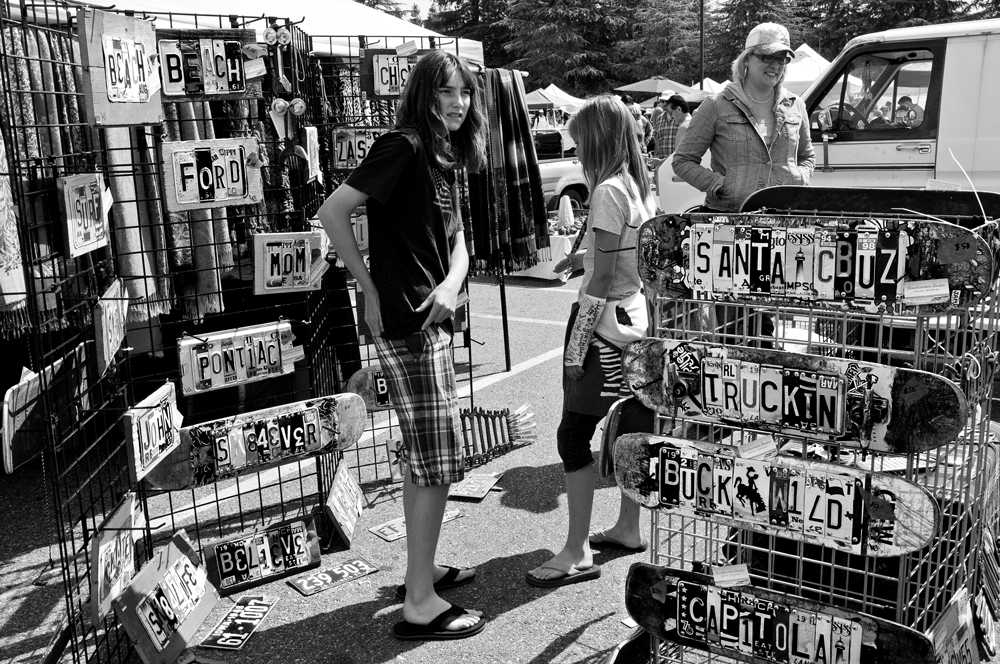 PLATE-BOARDIN  - This vendor stall at De Anza’s flea market sells customized skateboards with pieces of different states’ license plates attached forming messages like “Truckin” and “Buckwild.”