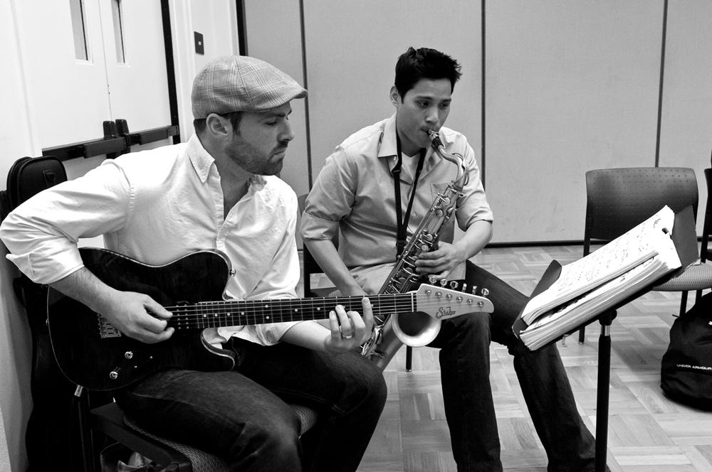 PERFORMING - De Anza Music major Oscar Pangilinan and San Jose State performance major Kenny Corse use music to attract students to the Lead auction annual fundraiser May 9.