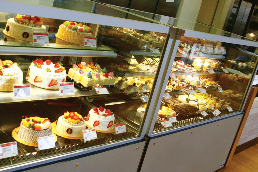 RAINBOW OF CAKES - People can enjoy the fun and playful vaiety of cakes offered at Kee Wah.