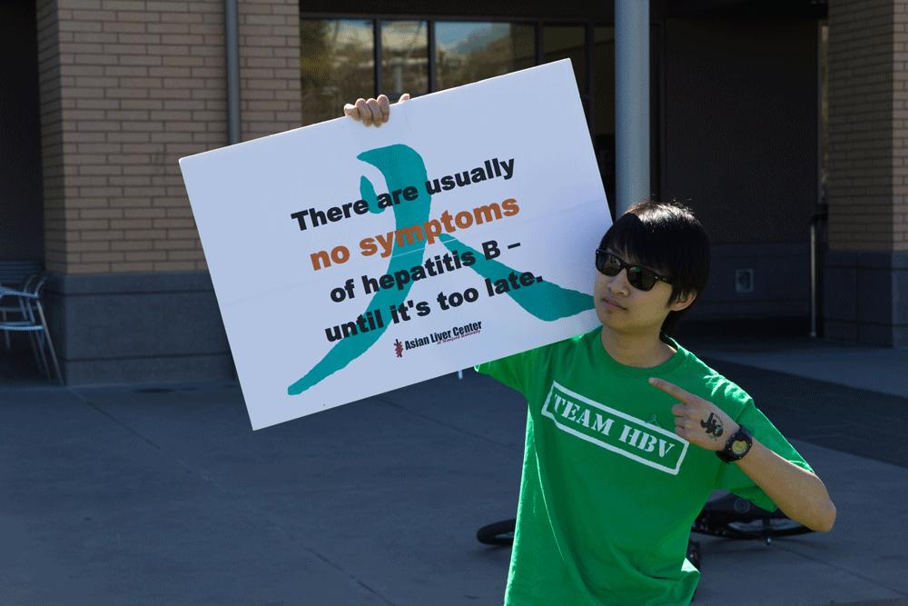 INFORMING - De Anza student, Sean Ho, 20, joins the freeze action along with the rest of his Team HBV.