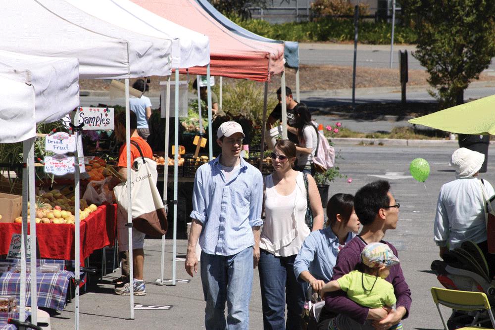 THE STRIP - Consumers browse up and down a food aisle at Cupertino’s Farmer’s Market on Saturday, April 21.