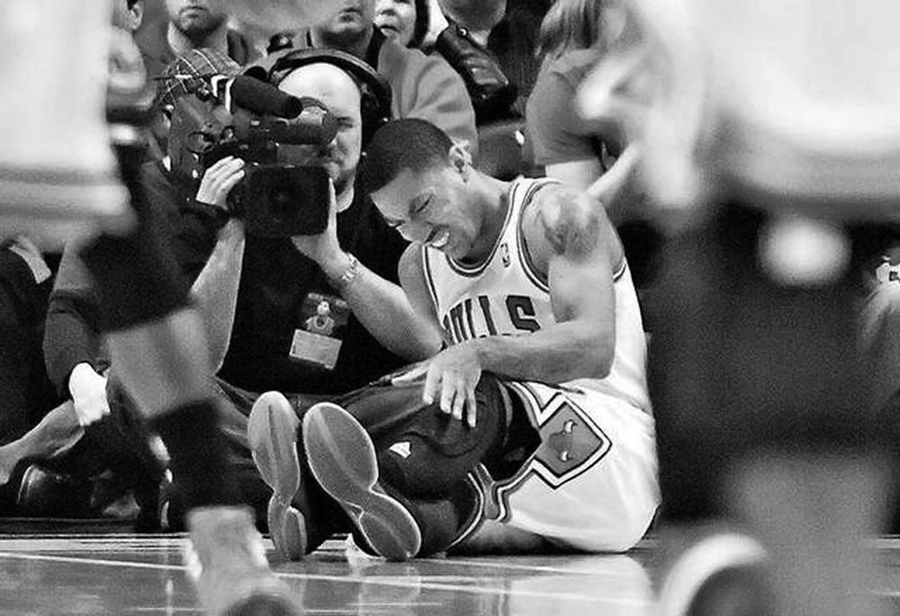 HURT STAR - Chicago Bulls player Derrick Rose suffers an acl injury April 28. 