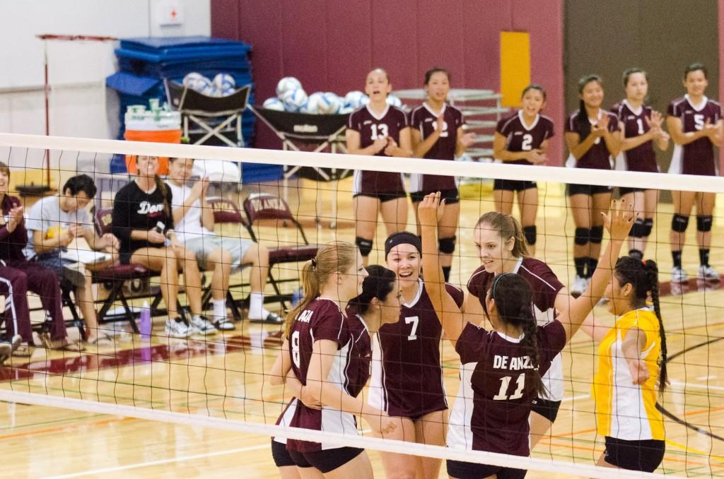 CELEBRATION - De Anza’s volleyball team celebrates a point they earned during Friday’s match against Hartnell College held at De Anza Oct. 5.