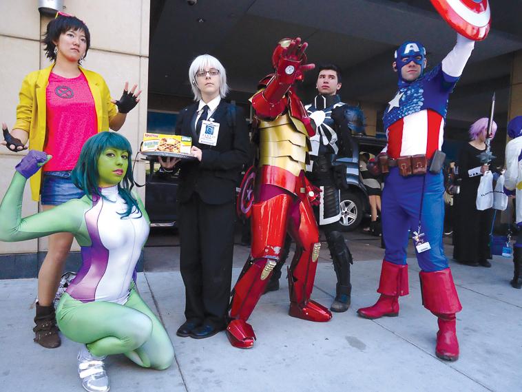 The Avengers Save The Day
Marvel superheros help a man in a suit sell waffles.