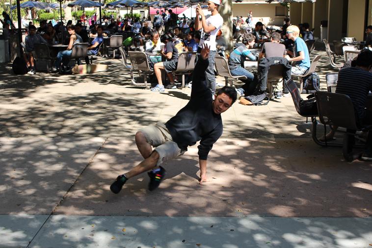 Economics major Thien Phan shows off his breakdance moves for the crowd as the Dennis Dove Band plays at the cafeteria patio During Welcome Week, Wednesday Sept 25.  This is the third year that the band filled De Anzas campus with their particular brand of old soul, funk, R&B and reggae.  Welcome Week was the first of many events the DASB has planned for the quarter.