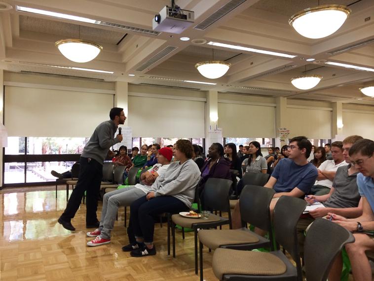 Chris Lepe, a community planner for non-profit organization TransForm, reaches out to De Anza College students during the “Talking Green” event on Oct. 17.