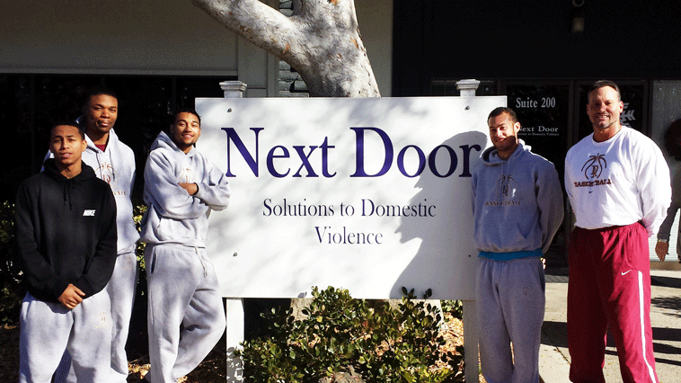 (from left) Nate Viera, Joe Foster, Kyle Conner, Chris Shaw, and Jason Damjanovic volunteer at Next Door: Solutions to Domestic Violence’s holiday boutique on Dec. 21, 2013. 