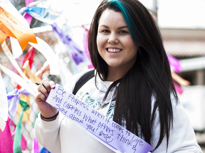 Brandy Roy, culinary chef, 22, writes her inspiration on a ribbon: Be fearless when it comes to life and careless what others think and say about you!