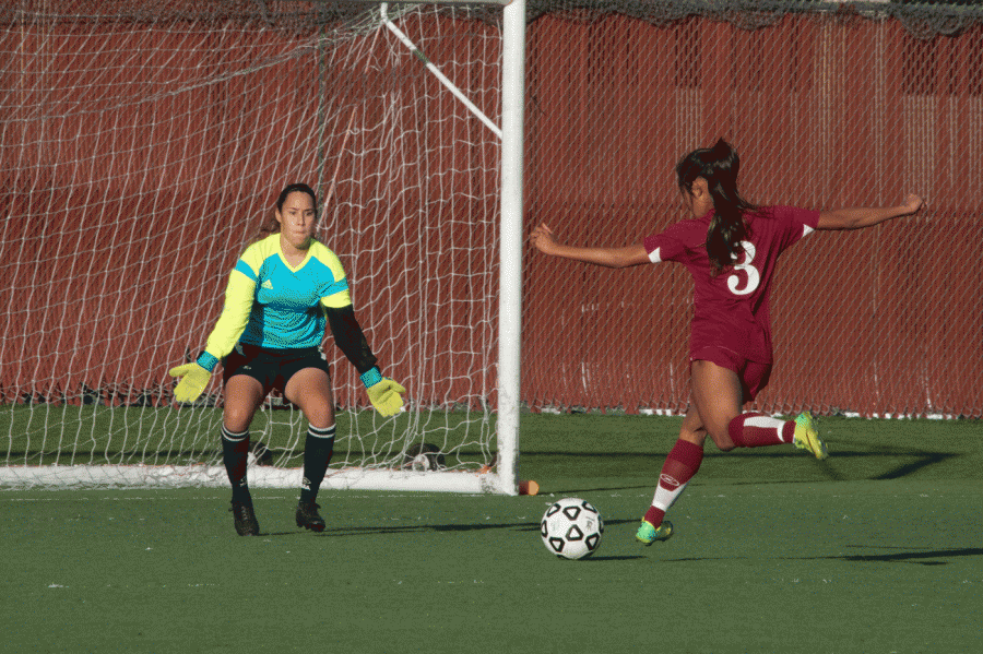 De Anza freshman forward Samantha Bustamante (3) takes a shot on goal against the West Valley goalkeeper. The Dons won their last game of the season 4-0 on Tuesday Nov. 11.