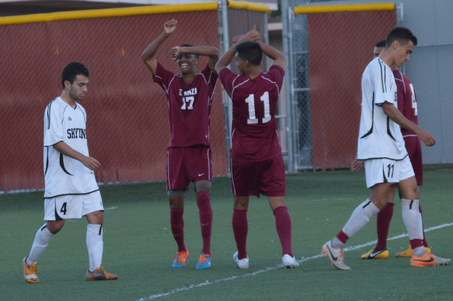 Sophomore forward Ranier Plantinos (11) and freshman forward Ahmed Mohammed (17) celebrate after Plantinos scored the third goal for the Dons. Plantinos had two goals in the game and Mohammed had one.