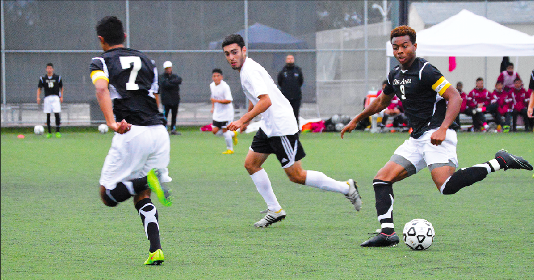 De Anza co-captain Rajaee Delane (9) plays a through ball to forward Jose Avalos (7) passing a Monterey defender. Delane had two shots on goal in the Dons’ 1-0 win over Monterey on Friday Oct. 31.