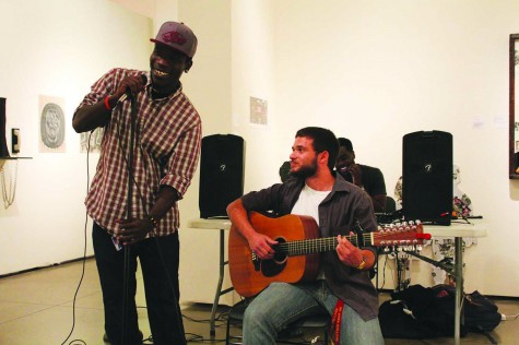 Student performances address social issues at Open Mic Night