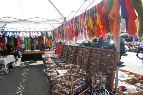 Clothes, jewelry and accessories are displayed at booth at the De Anza Flea Market on Saturday, Oct. 3. De Anza hosts the flea market on the first Saturday of every month and features hand crafted and unusual used goods.