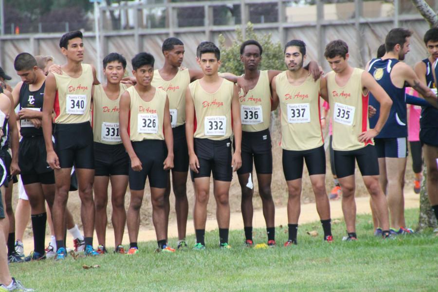 The De Anza mens cross country team huddle at the starting line of their race in Baylands Park, Sunnyvale on Saturday Oct. 17.