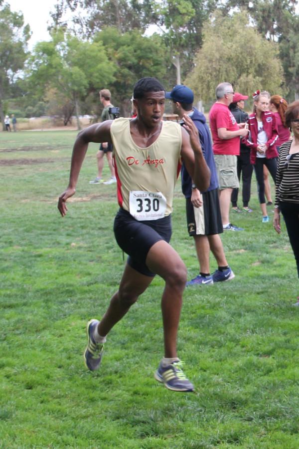 Freshman Ahmed Jama runs to the finish line at the Bronco Invitational where the Dons finished in 13th place.