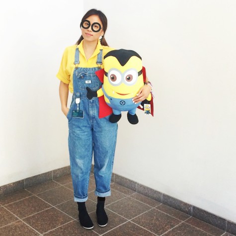 Cecile Hoang, staff writer, in a costume of a minion.
