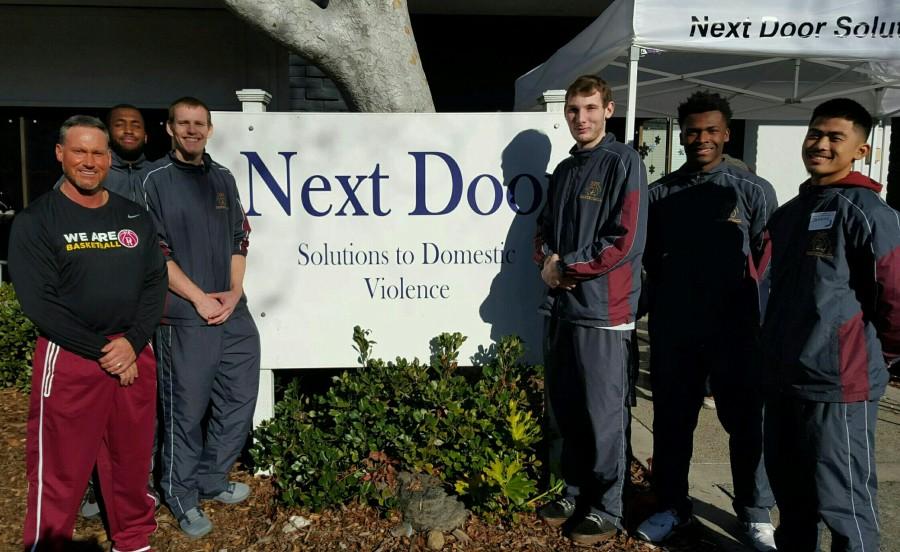  Head coach Jason Damjanovic (left) and a few players from the De Anza men’s basketball team participated in helping at a local womens shelter right before the winter holidays.