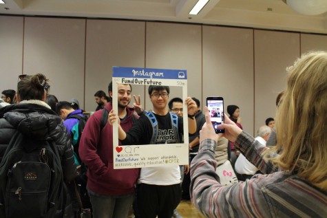 Christopher Schaffer, 19, liberal arts major, and Benjamin Dinh, 19, nutrition/food science major, pose for the Proposition 30 "Fund Our Future" campaign.