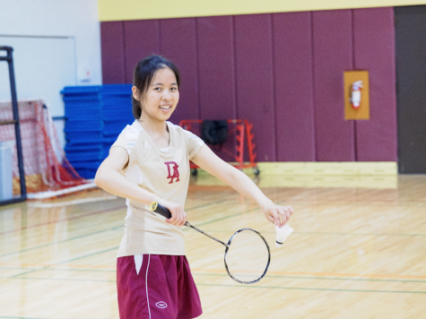 De Anza College freshman Yu Hsuan Liu smiles as she prepares to serve during the Badminton Coast Conference Finals on May 7.