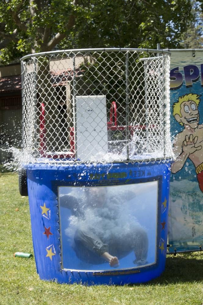 Kenzo Chua, 19, Film/TV major, falls into the Dunk Tank after a successful hit.