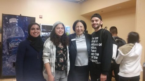 Foothill-De Anza Chancellor Miner talks to students, gives out cookies