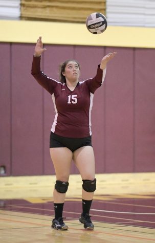 Volleyball captain: Leader at net, off court