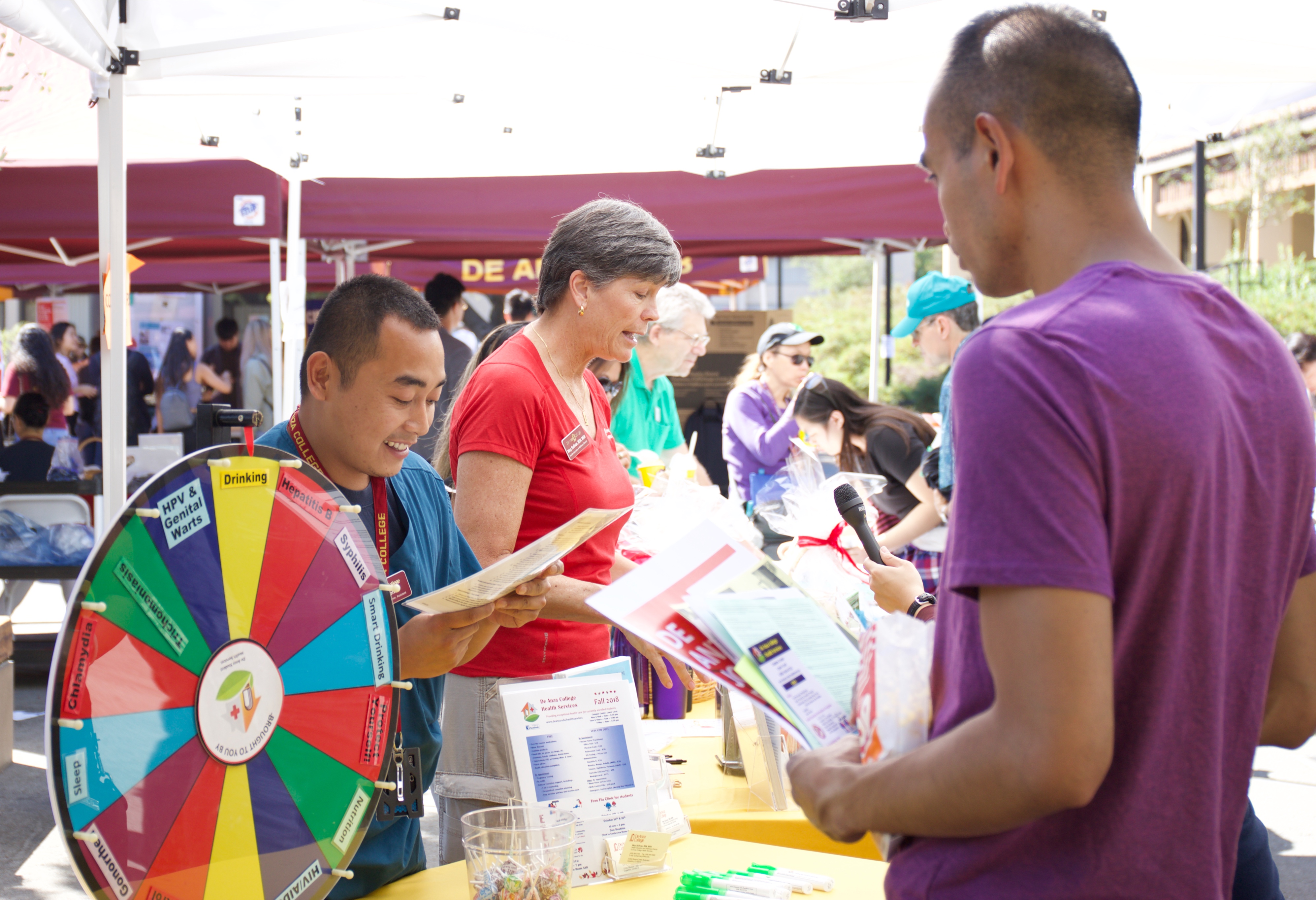 Mary Sullivan, Director of Health Education and Wellness and Gio Supnet , Administrative Assistant Student Health Services
talk to students on Welcome Day, Sept. 21.