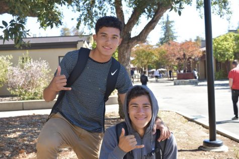 Standing: Christian Mendoza, 19, communications major: “I’m going to be a vampire.”

Sitting: Andres Garcia, 19, criminal justice major: “My girlfriend’s dressing as Minnie mouse and I’m going to be Mickey Mouse.”