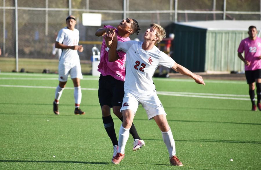 Alex Balleza, 21, kinesiology major, fighting for a header during a game on Tuesday, Oct. 30 against Las Positas at De Anza College.