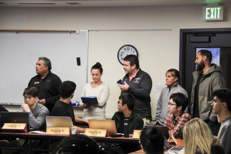 Athletic director Kulwat Singh, mens and womens water polo coach Danielle Altman and assistant athletic director Nick Mattis present a comment to the DASB senate about their thoughts on the budget cuts at the Feb. 6 meeting.