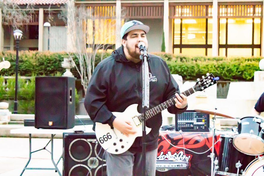 Lead guitarist Luis Ibarra stunningly sings at 4 Elements Hip Hop Open Mic Feb. 28 at the Sunken Garden.