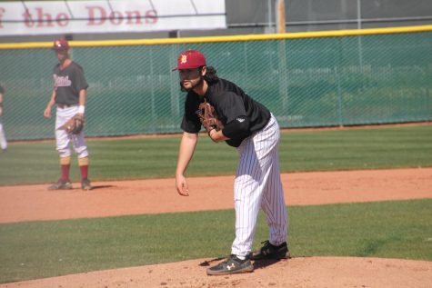 Antonio Triest Escobar, 19, communications major, looks for the right pitch against San Mateo in a home game on March 12.