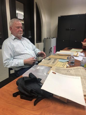 Phillip Plymale brings documents from the Senates history to show current Senators as he recalls the De Anza Student Bodys history.