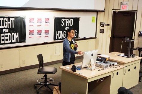 Alex Chow Yong-kang, vice president of the Hong Kong University Students’ Union, explains the Hong Kong protesters’ five demands on Nov. 21 at De Anza College