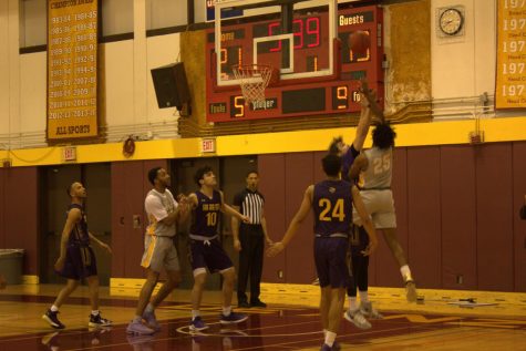 Aaron Tomlinson, 20, psychology major going up for a contested against San Jose City College on Jan. 15. 