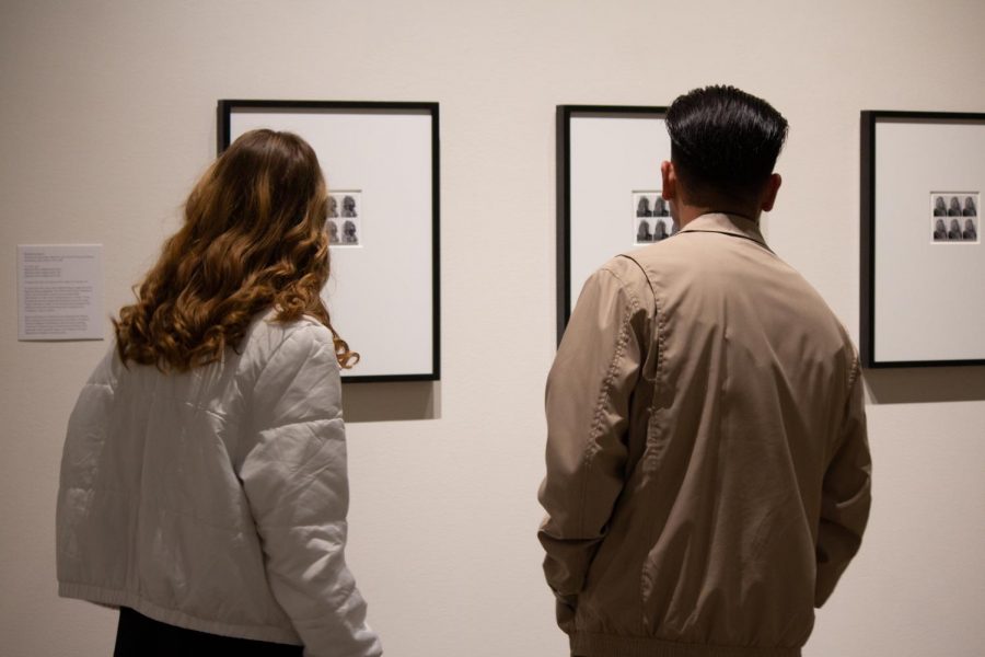 Couple looks at the artwork in ICAs extended hours: Art after Dark