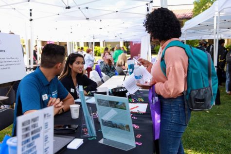 Student checking out booth at De Anza Job Fair.