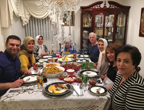 Professor Dada and her loved ones eating together for eftar.
