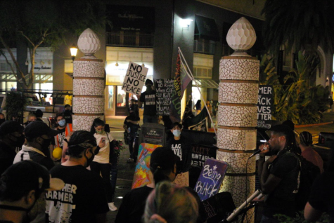 Black Lives Matter protesters fill the streets of Santana Row in San Jose to demand justice for the death of former San Jose State University student Gregory Johnson.