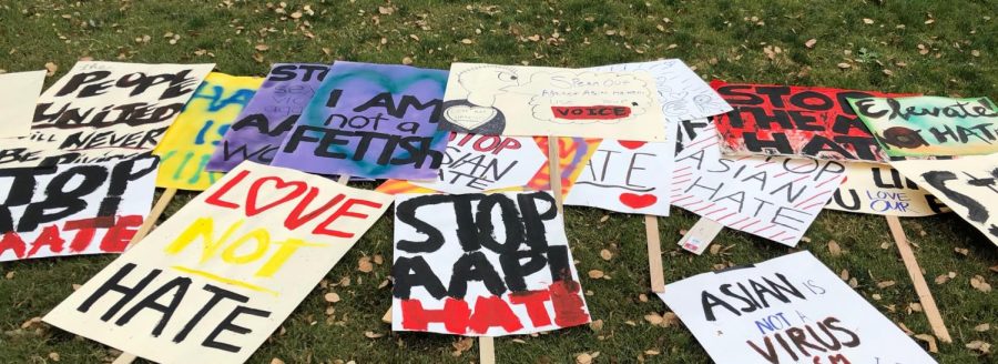 Signs from Stop Asian Hate rally in downtown San Jose at the Plaza de Cesar Chavez