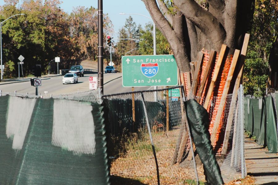 Freeway signage on the corner of Vallco’s demolition site points travelers towards major freeways, leading to other cities.