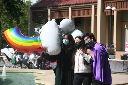 Students pose with the balloon from the LGBTQ Alliance Club. (Left to right: Sai Manaswini Nabadhanam, 21, computer science major; Celine Nghiem, business administration major; Tahoe, political science major.)