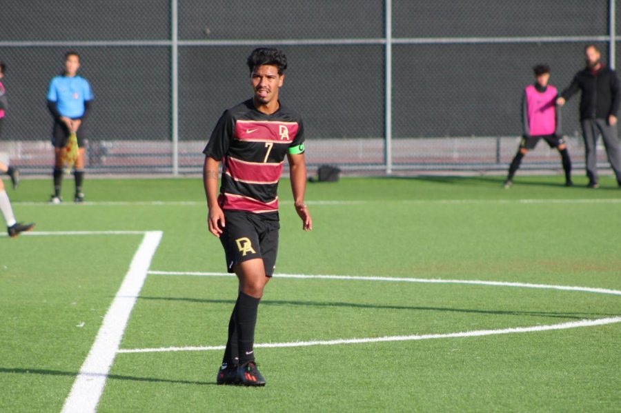 Cesar Cornejo keeping an eye out for the ball while playing against Cañada Colleges soccer team at De Anzas soccer field on Nov. 4.