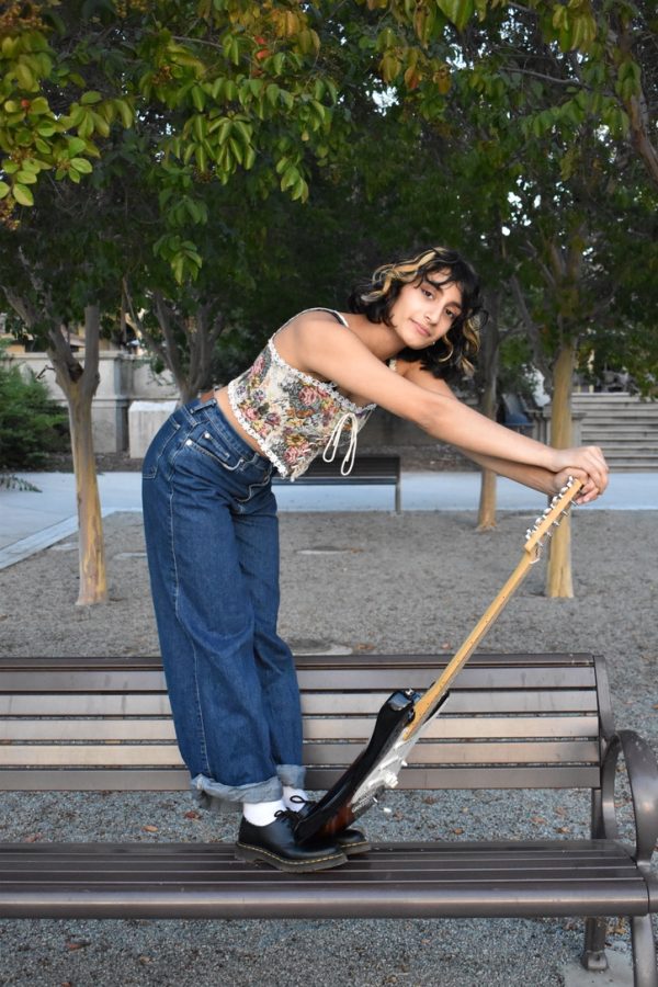 Shravya Patibanda in De Anza Colleges sunken garden with her electric guitar on Saturday, Oct. 15.