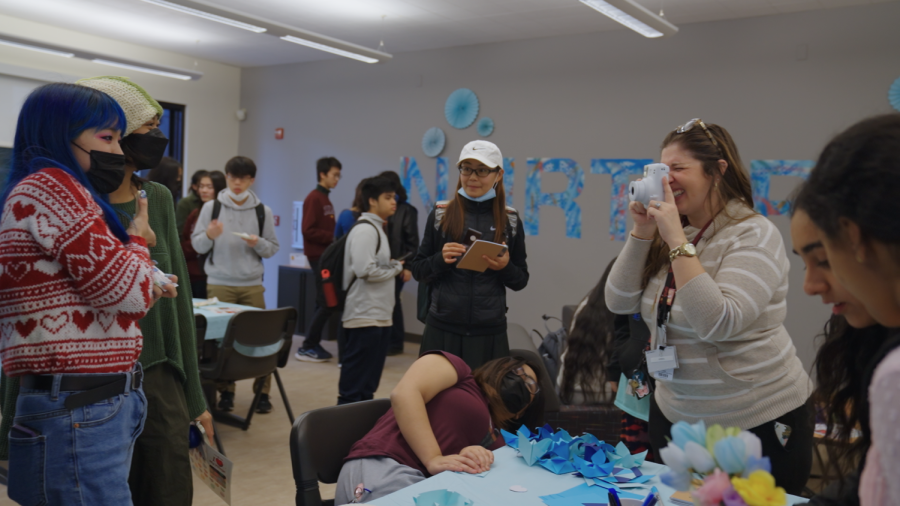 Students participate in activities in the health and life sciences village on Feb. 14.