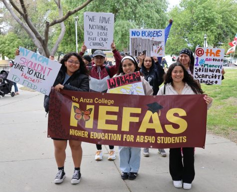 De Anza students from the Higher Education for AB540 Students organization attend the rally in Roosevelt Park on May 1. The group advocated for workers rights and immigrant rights at the event. 