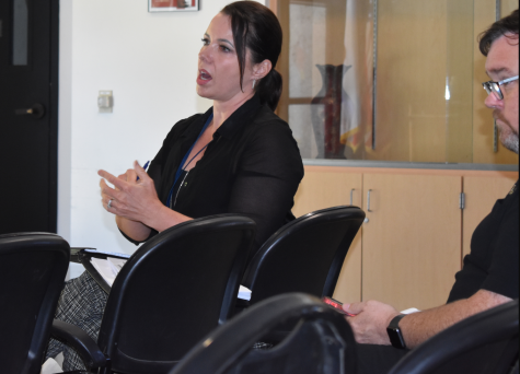 Joy Garza, FHDA police department training manager, explains how  information is shared to the public when active shooters are detected, at the Community Town Hall Forum in Foothill Colleges Hearthside Lounge on May 31.
